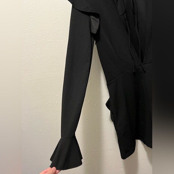 Zara Collections black, long sleeved romper. - Picture 4 of 5